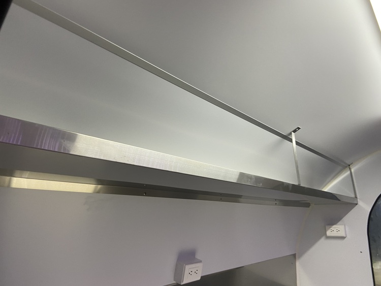 wall shelf in food trailer bar