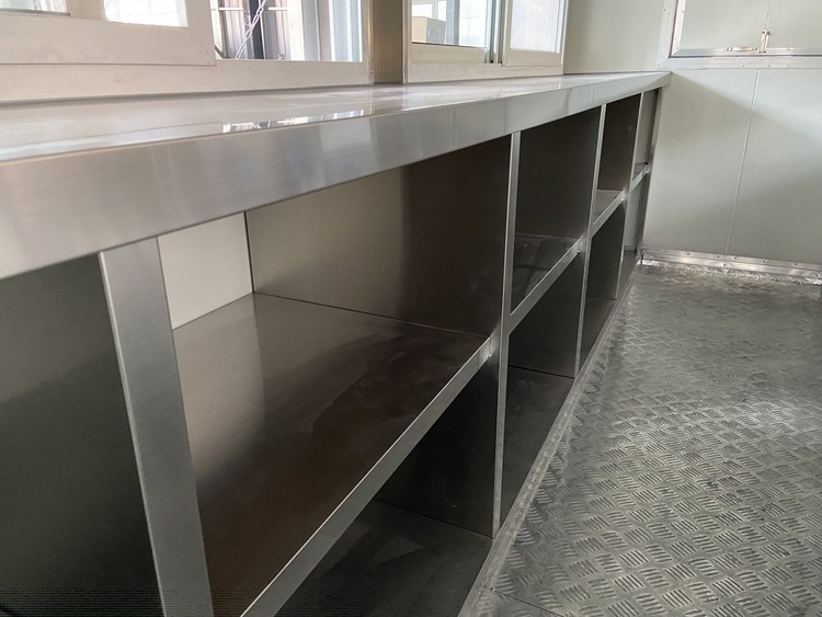 stainless steel worktables in the food vending trailer