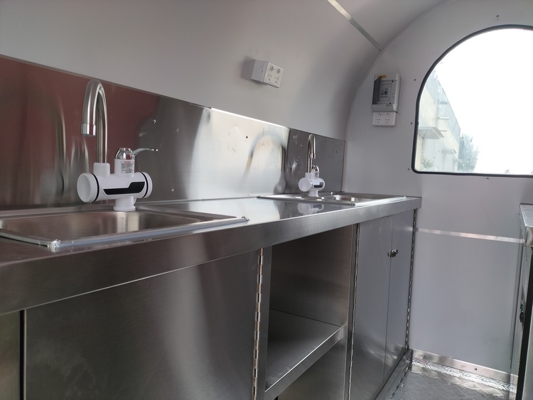 the interior of the small mobile ice cream trailer for sale